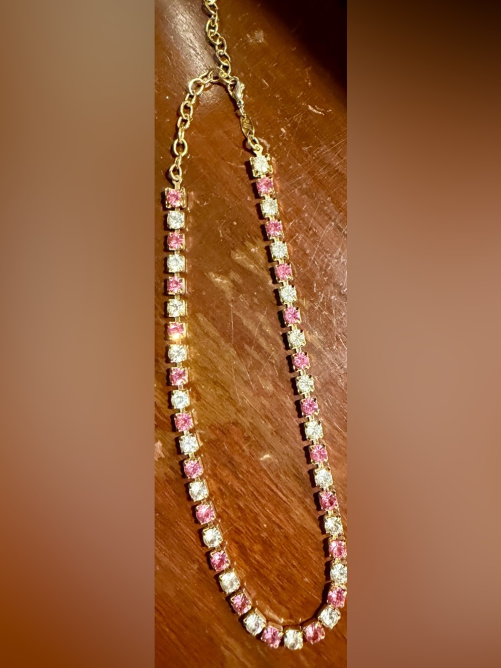 Gold-Tone Pink & Clear Crystal Tennis Necklace - necklace by Trifari Tm.